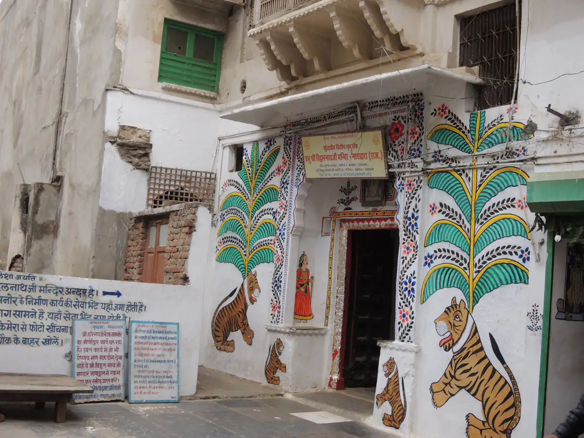 Doorway in Nathdwara painted with tigers and trees in the local folk style
