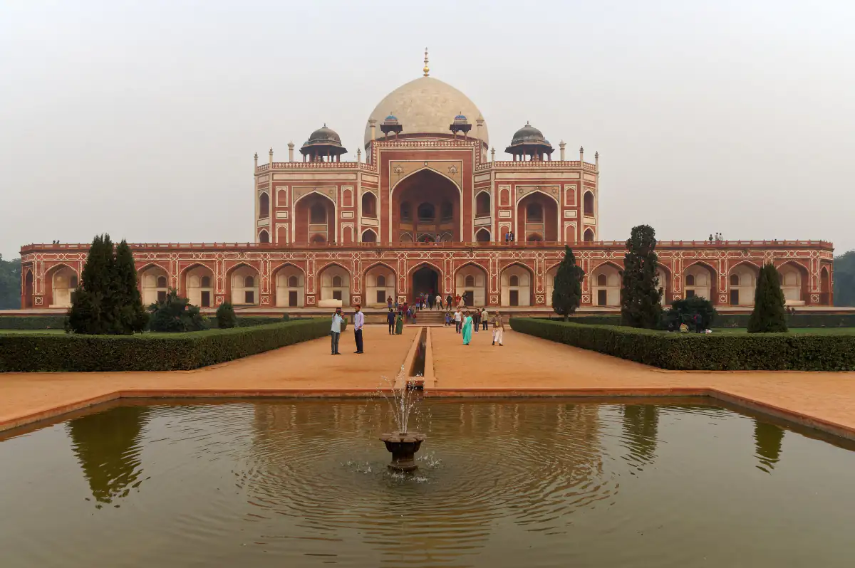 Humayun's Tomb in Delhi reflected in the garden fountain pool