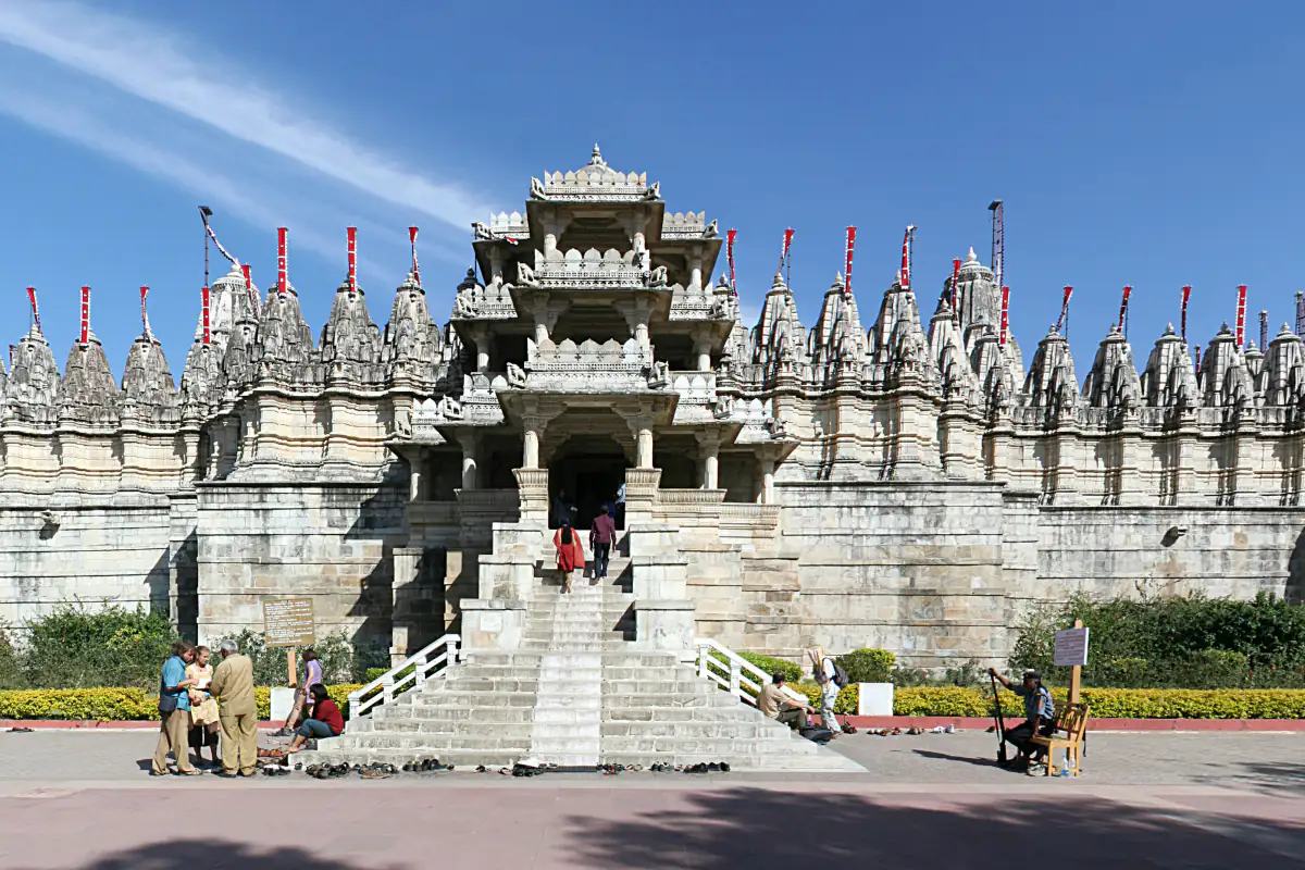 Marble Chaumukha Jain temple at Ranakpur under a blue sky