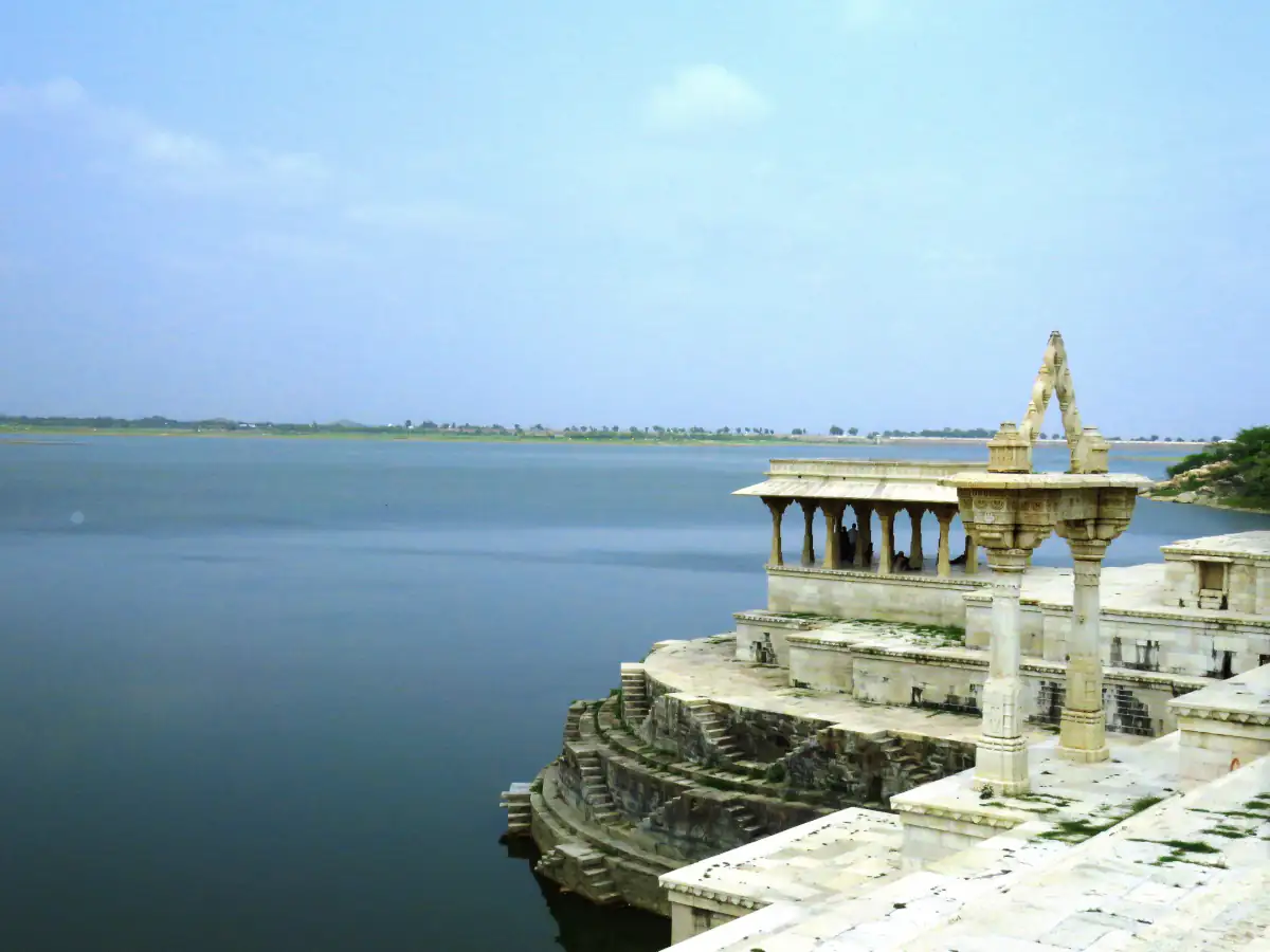 Marble pavilions and torana arch on the Nau Chowki ghat of Rajsamand Lake