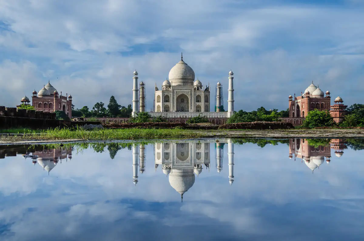 Taj Mahal reflected in the Yamuna waters from the Mehtab Bagh side, Agra